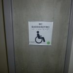 Picture of the actile sign to the accessible toilet