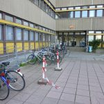 Main ramp on the left side, partly obscured by the bicycles