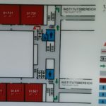 Picture of the first mezzanine level tactile floor plan. When exiting the lift connected to the guiding system, you will find it on the opposing wall to the left of the door directly across from the lift.